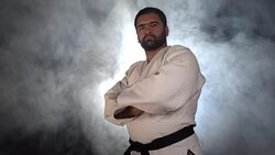 Judokas fighter looking at camera Stock Footage