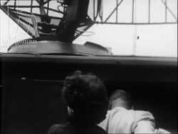 US citizens in streets, anti-war protest, people debating. Clip from 1960s Cold War educational film. Stock Footage