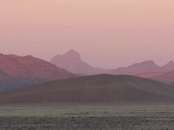 Hills in evening haze, Sossusvlei, Namib-Naukluft, Namibia Stock Footage