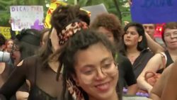 Female activists hold their annual march on Copacabana beach News Clip