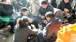 CLEAN: Millions board trains and buses across China to journey home for News Clip