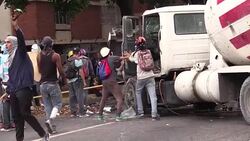 CLEAN : Venezuelan police, protesters clash in clouds of tear gas News Clip