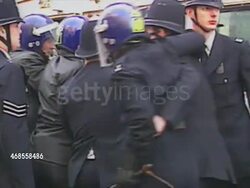 Police Putting Anti-Poll Tax Protester Into Police Van News Clip