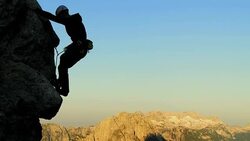 HD: Rock Climber Chalking His Hand Stock Footage