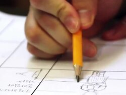 CU Shot of hand working on storyboard with pencil / Seoul, South Korea Stock Footage