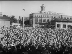 1952: UNITED STATES PRESIDENTIAL ELECTION:  VS Large crowds gather around train, Adlai Stevenson II at microphone waving to people, speaking (no SOT), crowds around, Dwight 'Ike' Eisenhower speaking at mic (no SOT). Campaign, political rally Instructional Video