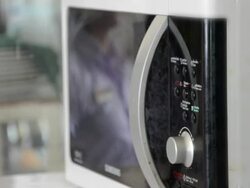 Setting microwave Stock Footage