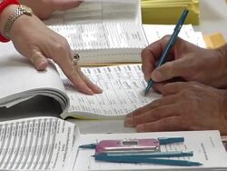 CU, Voter signing in at polling place, Toledo, Ohio, USA Stock Footage