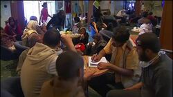 Ship with migrants, Libyan evacuees escorted out of Misrata News Clip