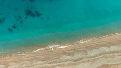 Aerial video: Clear water with algae on the seabed Stock Footage