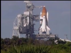NASA managers decide to try for a nighttime launch for shuttle Discovery, despite dicey weather reports. News Clip