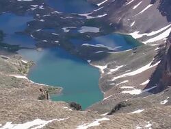 MS AERIAL Shot of lakes in valley at Granite Peak montain area / Montana, United States Stock Footage