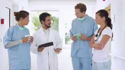 HD: Senior Doctor Mentoring Medical Students Stock Footage