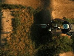 HD Super Slow-Mo: Dirt Rider Performing Superman Bmx Trick Stock Footage