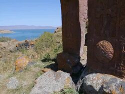 Hayravank monastery, Sevan lake, khachkars and view of the Sevan lake in the background Stock Footage