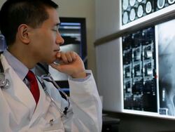 CU PAN Doctor looking at x-rays / Albany, New York, United States Stock Footage