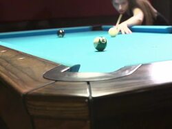 woman shooting pool at a nighclub Stock Footage