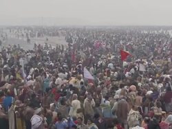 WS PAN Ganga Mela festival people crowding on river bank / India Stock Footage