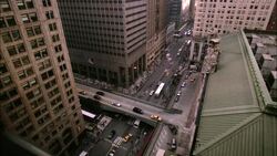 Traffic moves along the elevated streets of Park Avenue and 42nd Street in front of Grand Central Station. Stock Footage