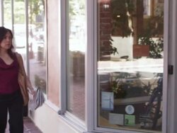 MS PAN Woman  walking  to work and  opens office door  / Portland, Or, United States Stock Footage