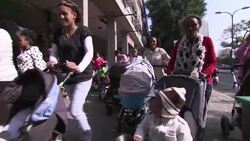 Women and children in latest of series of protests by African immigrants News Clip
