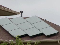 Array of solar panels on Pecan Street Inc house Stock Footage