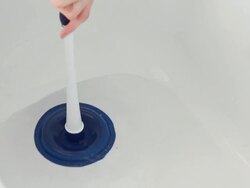 Cleaning bath with plunger Stock Footage