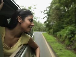 Young woman watching from window of a car, Malshej Ghat, Maharashtra, India Stock Footage