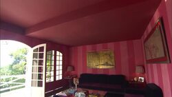 Sofas and a large coffee table furnish a room at La Maison Hotel in Rio de Janeiro. Stock Footage