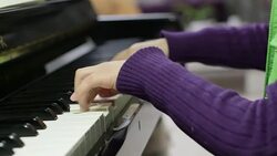 boy playing the piano Stock Footage