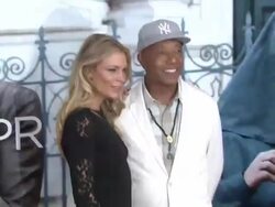 Russell Simmons and Temla Thormattosidir at the 'Eat Pray Love' New York Premiere Stock Footage