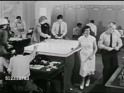 1951: WHAT-IF SCENARIO: SYRACUSE 'AFTER': INT Operations Center, people busy answering telephones, passing notes, man working on chart, 'debris' push pins in city grid map.  1950s Horror, 1950s Sci-fi, B Movie, Science fiction, Red Scare, McCarthyism. Instructional Video