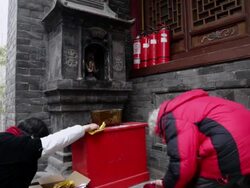 MS TD Pilgrims praying to Buddha's in temple during Chinese Lunar New Year / xi'an, shaanxi, china Stock Footage