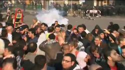 Tear gas fired at protesters rallying against government Instructional Video