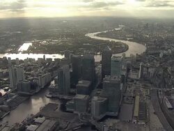 Aerial W/S City of London with Canary Wharf foreground with God-Rays Stock Footage