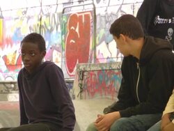 CU Shot of Children playing skateboard / Paris, France Stock Footage