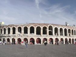 MS Tourists roaming in front of Arena di Verona at Piazza Bra / Verona, Veneto, Italy Stock Footage
