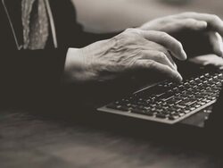 Senior woman typing Stock Footage