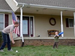 Father and son hit baseball Stock Footage