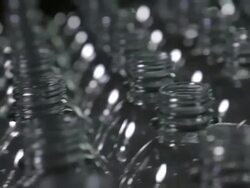 CU Empty soda beverage bottles on bottling line / soda and beverage manufacturing Stock Footage