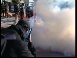 WRAP Violent clashes in latest protests; demonstrators holed up at law faculty, clean-up News Clip