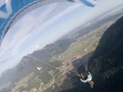 A young man paragliding over a European landscape. - filmed in Munich, Germany, Europe Stock Footage
