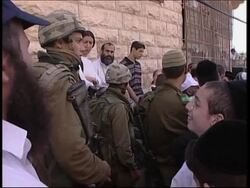 Jewish settlers dedicate apartment building News Clip