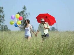 Young couple romancing in the forest, Haryana, India Stock Footage
