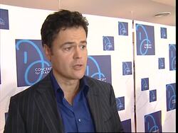 AP cover of intvs with performers, security News Clip