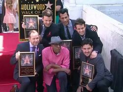 New Kids On The Block posing with plaques and Arsenio Hall at New Kids On The Block honored with star on the Hollywood Walk of Fame in Hollywood Stock Footage