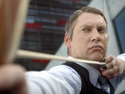 HD Super Slow-Mo: Businessman Shooting With A Bow Stock Footage