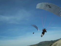 WS PAN POV Man paragliding over mountain / Lehi, Utah, USA. Stock Footage