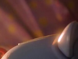 close up hand of girl putting coin in piggy bank Stock Footage