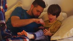 Father and Son Using Digital Tablet Stock Footage